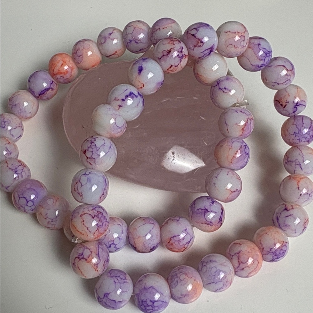 Two 8mm glass beaded stretch bracelets